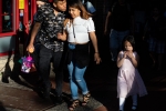 Family, Roosevelt Ave. Jackson Heights, Queens, NY. 2019.